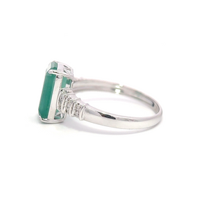 Emerald Radiance Silhouette Ring