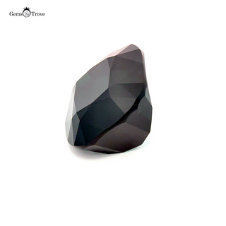 Rich green-blue tourmaline on white background.