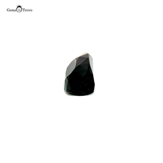 Rectangular green indicolite tourmaline gemstone highlighting its unique hue.