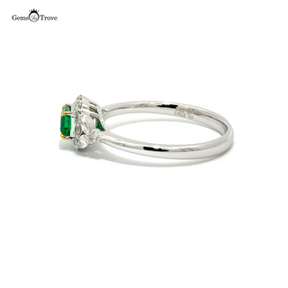 Beautiful vintage emerald engagement ring with a lush green emerald and brilliant diamonds, all in luxurious 18K solid gold.