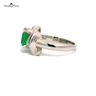 Heirloom emerald ring with engraved platinum band