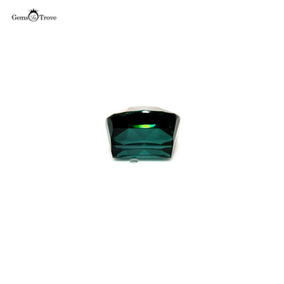Natural green indicolite tourmaline gem, rectangular cut, showcasing clarity and depth.
